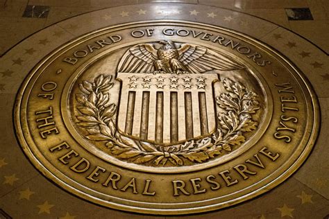Fed keeps rates unchanged but signals likelihood of another hike this year